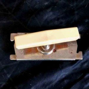 ANTIQUE EDLUND TOP OFF BOTTLE AND JAR OPENER WITH CREME COLORED PLASTIC HANDLE